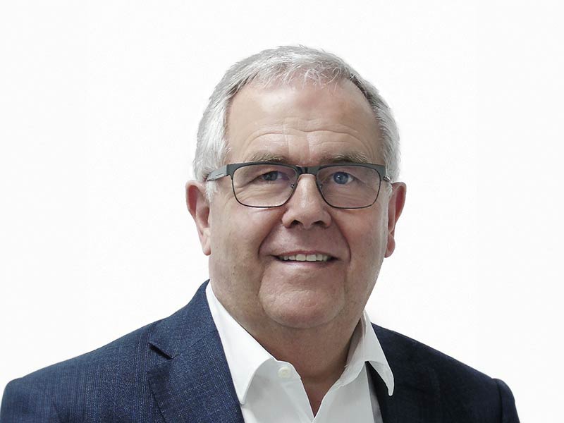 Prokurist Heinz Herbort, lächelnd